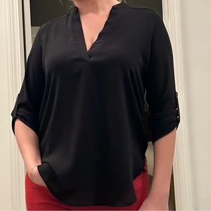 Black Lush top size xs with buttons to roll sleeves